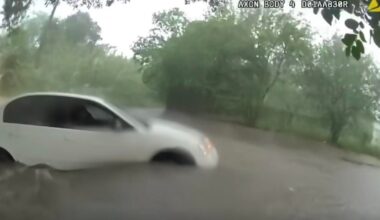 Video shows infant being rescued from car trapped in Texas floodwaters