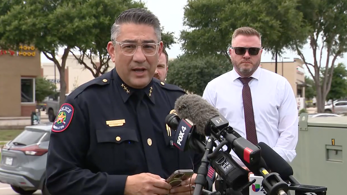 Carrollton Police Chief Roberto Arredondo briefs the press following a shooting in Carrollton, Texas.