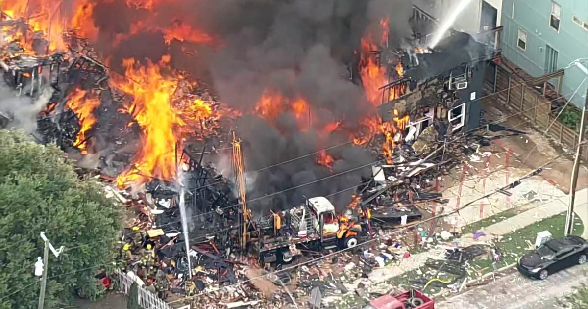Large fire, possible explosion destroy Dallas apartment building with at least one person hospitalized, DFR says