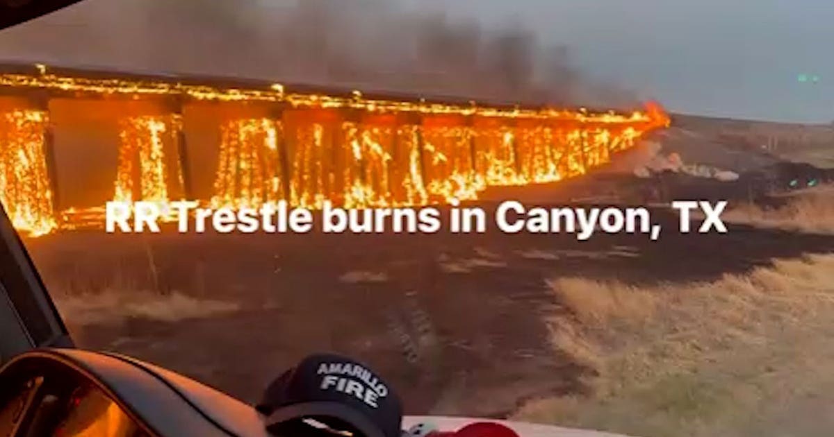VIDEO: Texas train trestle burns during wildfire