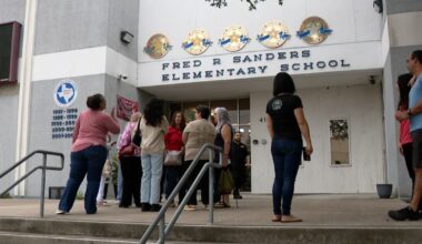 Students and alumni take final walk through Sanders Elementary