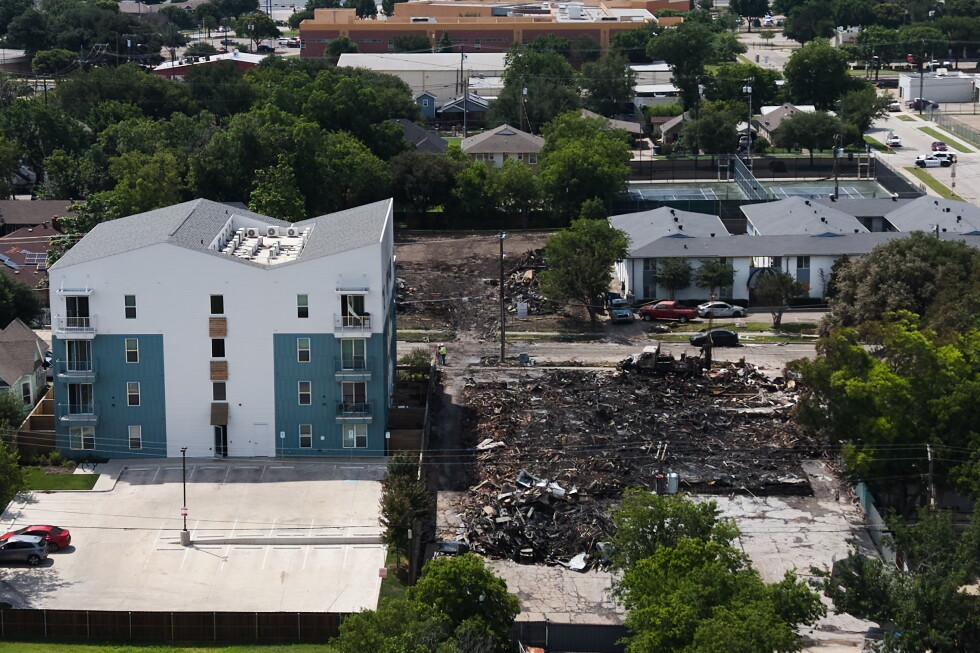 Dallas chief says firefighters were outside apartment building when it exploded