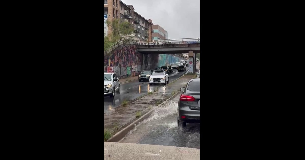 Waymo caught on camera stalled by puddle on Austin road