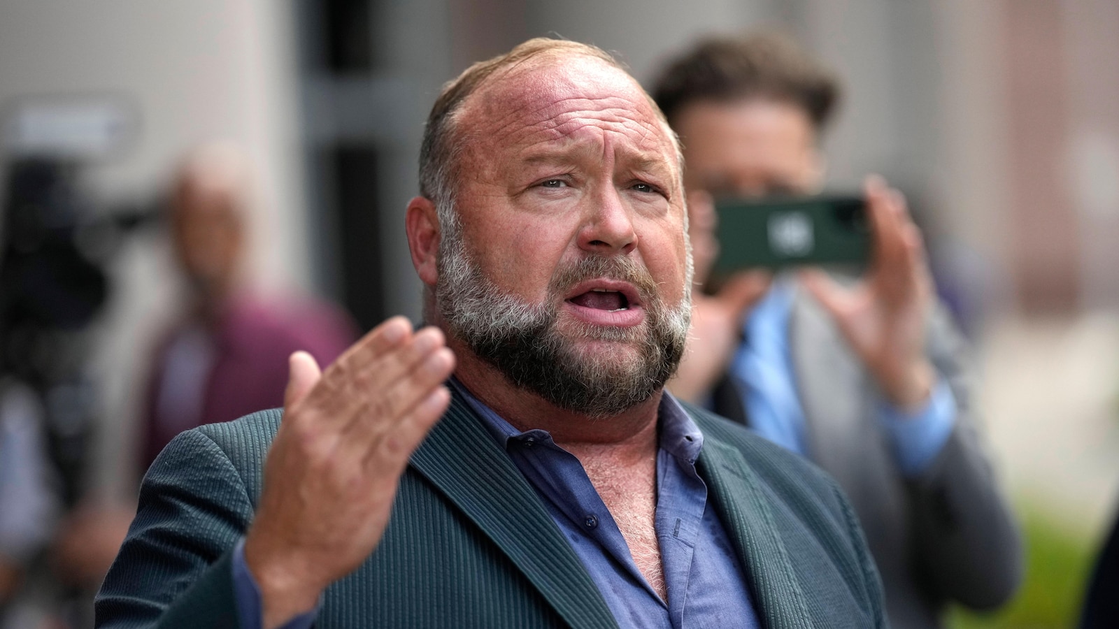 The Onion's bid to take over Alex Jones' Infowars is in limbo as new court battles emerge
