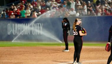 Sprinklers go off, interrupting the Women's College World Series softball game between Texas Tech Red Raiders and the UCLA Bruins at Devon Park in Oklahoma City, May 31, 2026.