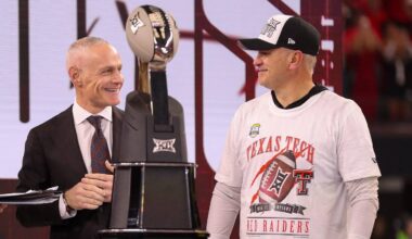Texas Tech head coach Joey McGuire stands with commissioner Brett Yormark (middle) and ESPN's Katie Georgie after winning Big 12 Championship football game, Saturday, Nov. 6, 2025, at AT&T Stadium in Arlington.