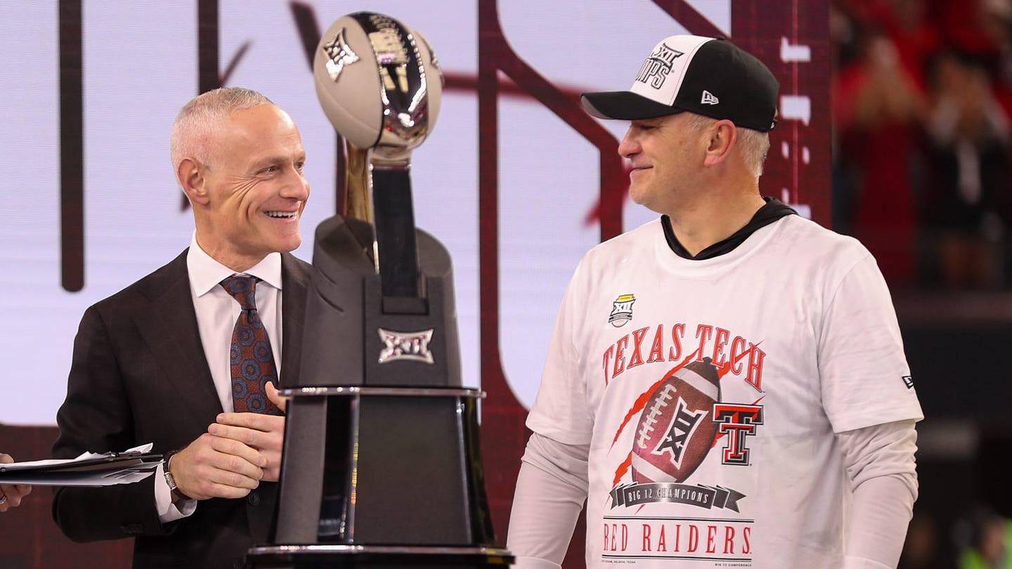 Texas Tech head coach Joey McGuire stands with commissioner Brett Yormark (middle) and ESPN's Katie Georgie after winning Big 12 Championship football game, Saturday, Nov. 6, 2025, at AT&T Stadium in Arlington.