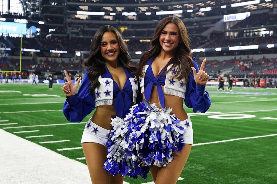 Two former Texas Tech cheerleaders now Dallas Cowboys cheerleaders on the field before the Edward Jones Big 12 Championship game between the Texas Tech Red Raiders and BYU Cougars on December 6, 2025, at AT&T Stadium in Arlington, Texas.