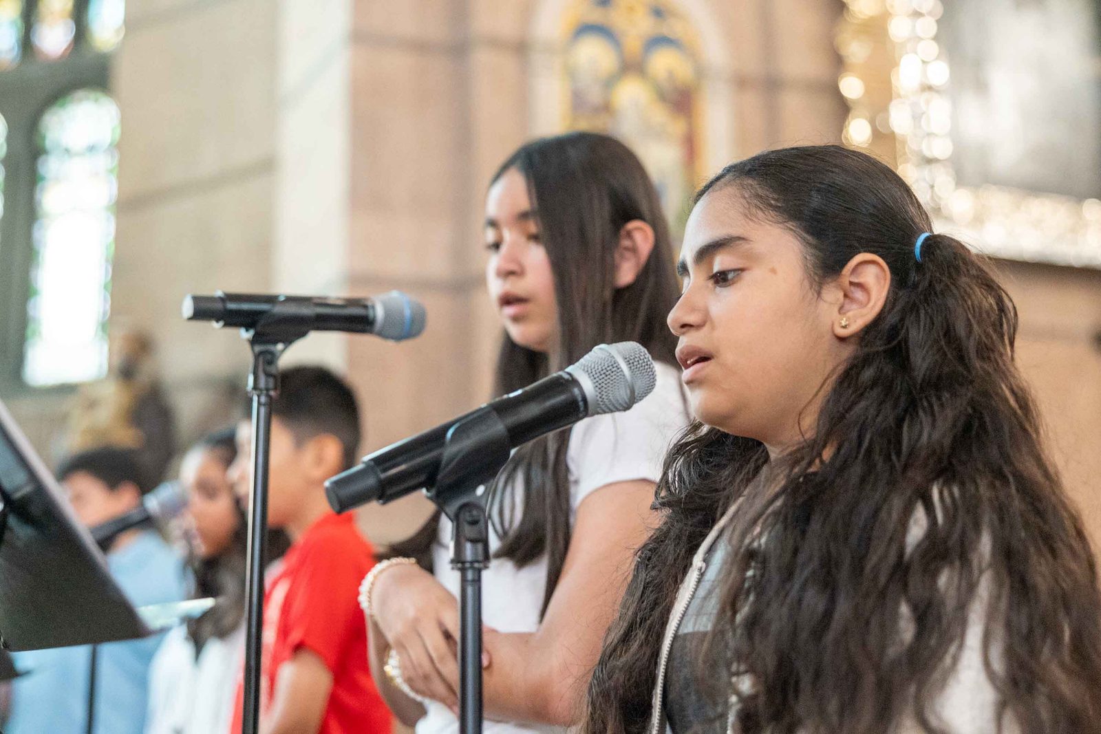 The youth choir sings during the Corpus Christi Mass at the Shrine of the Sacred Heart in Washington on June 7, 2026. (Catholic Standard photo/Mihoko Owada)
