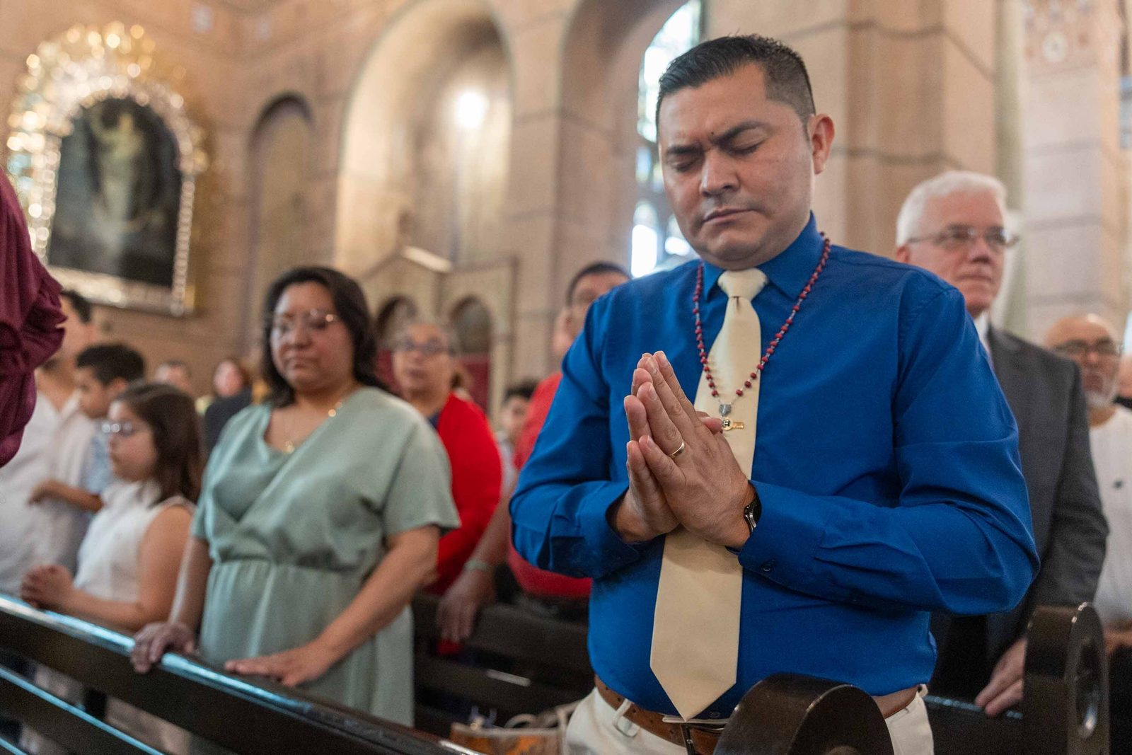 Families and parishioners pray together during the Corpus Christi Mass at the Shrine of the Sacred Heart in Washington on June 7, 2026. (Catholic Standard photo/Mihoko Owada)