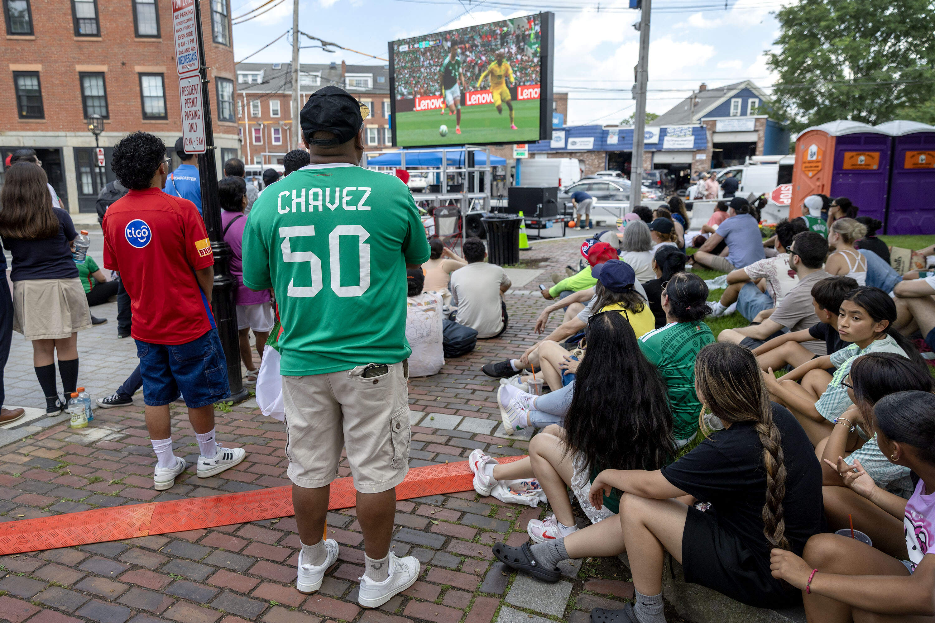 Soccer fans gathered in Chelsea watch Mexico play South Africa in the 2026 World Cup. (Robin Lubbock/WBUR)