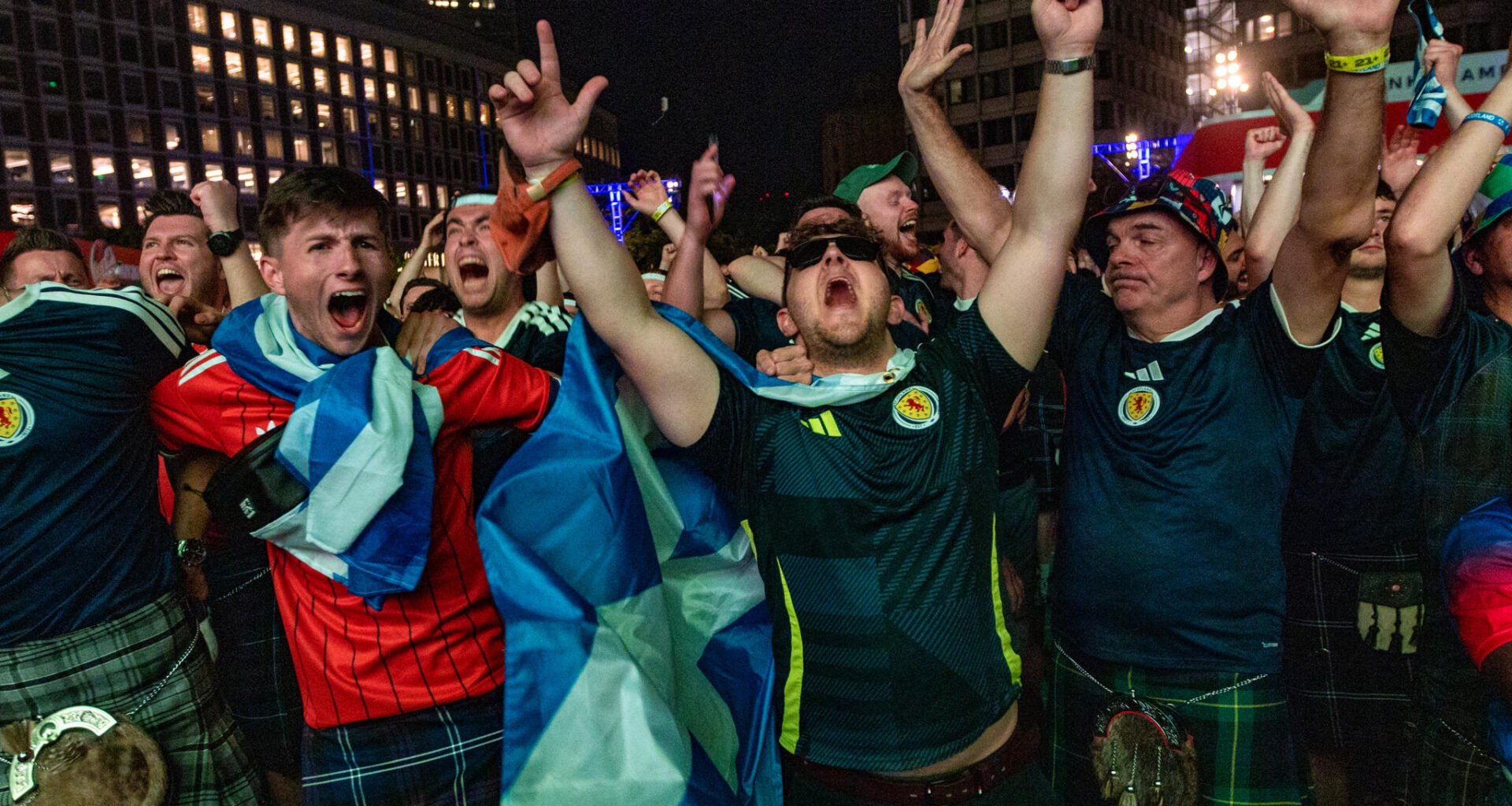 Scottish fans erupt as Scotland holds on to win their first game of the World Cup against Haiti 1-0 at the FIFA Fan Festival Boston at City Hall Plaza. (Jesse Costa/WBUR)