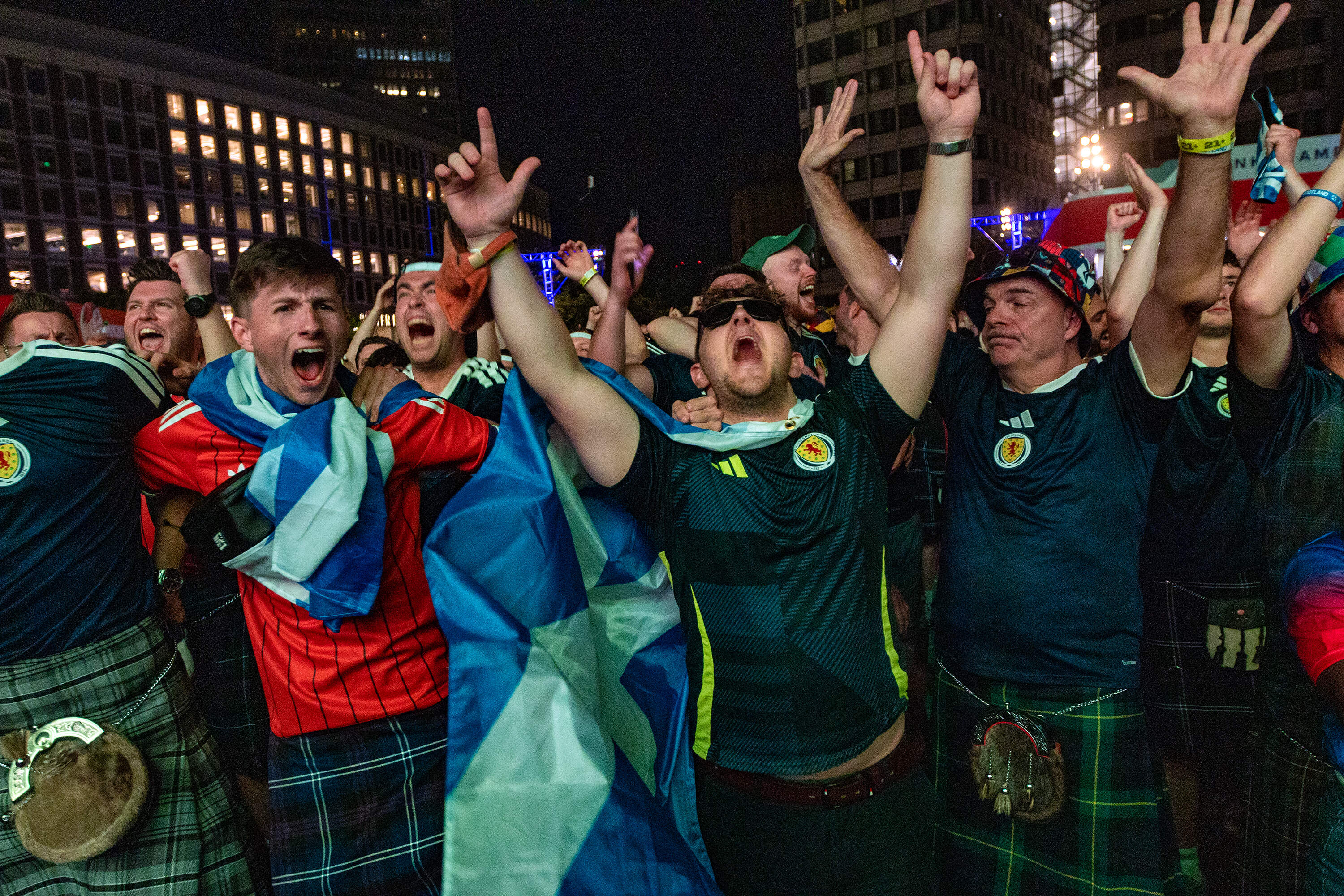 Scottish fans erupt as Scotland holds on to win their first game of the World Cup against Haiti 1-0 at the FIFA Fan Festival Boston at City Hall Plaza. (Jesse Costa/WBUR)