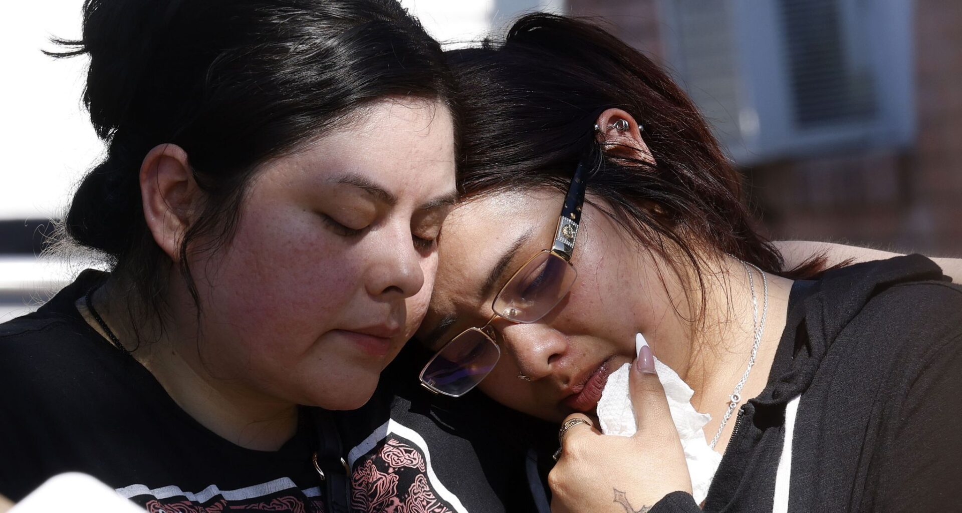 Marisol Pérez’s sisters Maria Lopez, left, and Rosalinda Martinez are seen during a vigil for Marisol and her son Erik Pérez Jr., Sunday, May 31, 2026, in Dallas. Marisol and Erik Jr. died in the Oak Cliff fire on Thursday.