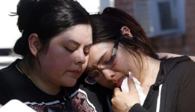 Marisol Pérez’s sisters Maria Lopez, left, and Rosalinda Martinez are seen during a vigil for Marisol and her son Erik Pérez Jr., Sunday, May 31, 2026, in Dallas. Marisol and Erik Jr. died in the Oak Cliff fire on Thursday.