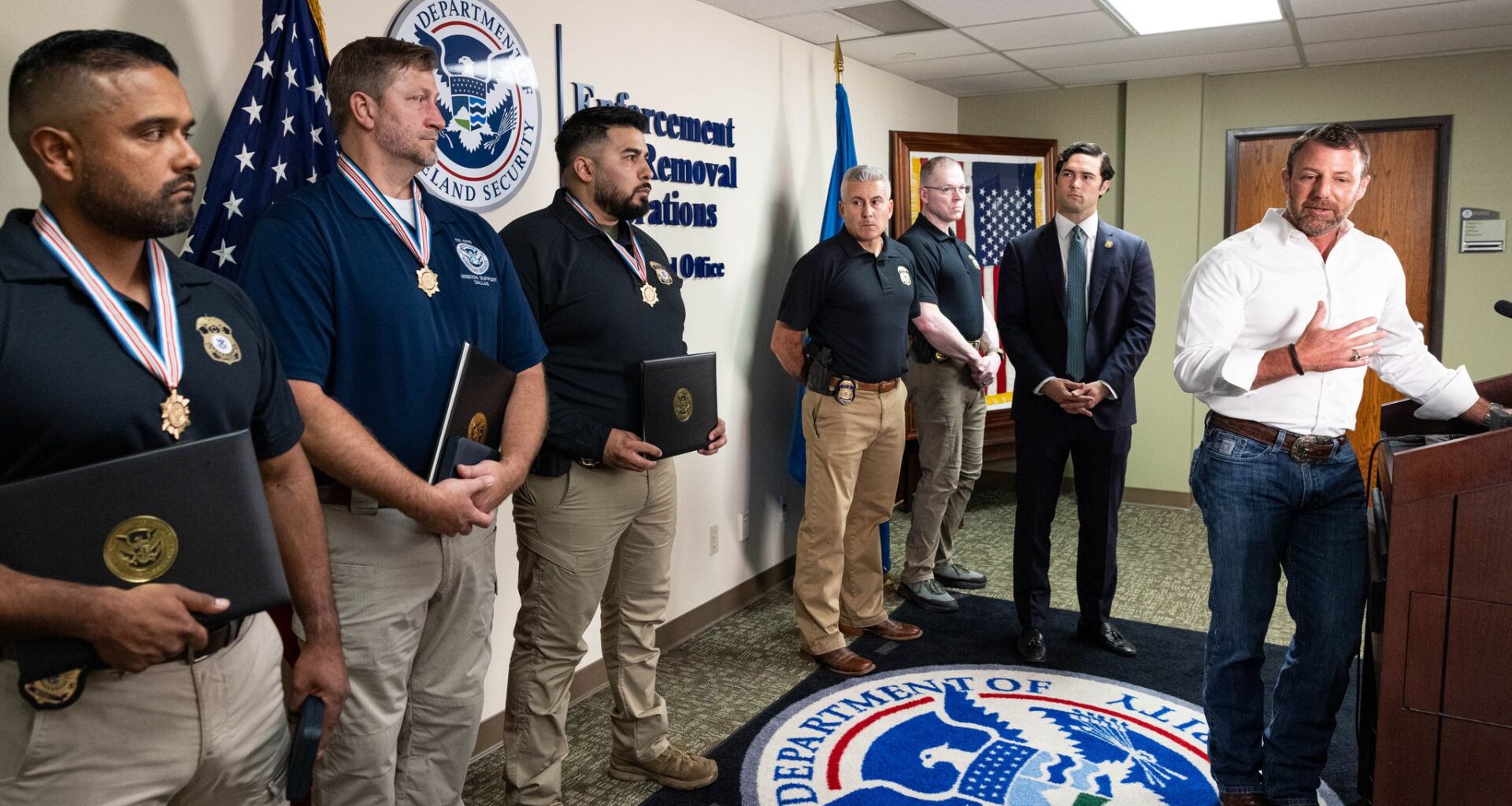 Dallas ICE officers are honored by Secretary of Homeland Security Markwayne Mullin for their actions during the 2025 shooting at the Dallas ICE field office in Dallas, Monday, June 1, 2026.