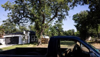 A contemporary house sits vacant across from Alvin Mouton's home on Warren Avenue on July 7, 2025, in Dallas. Mouton said he likes the style and build of the new home in the Queen City neighborhood.