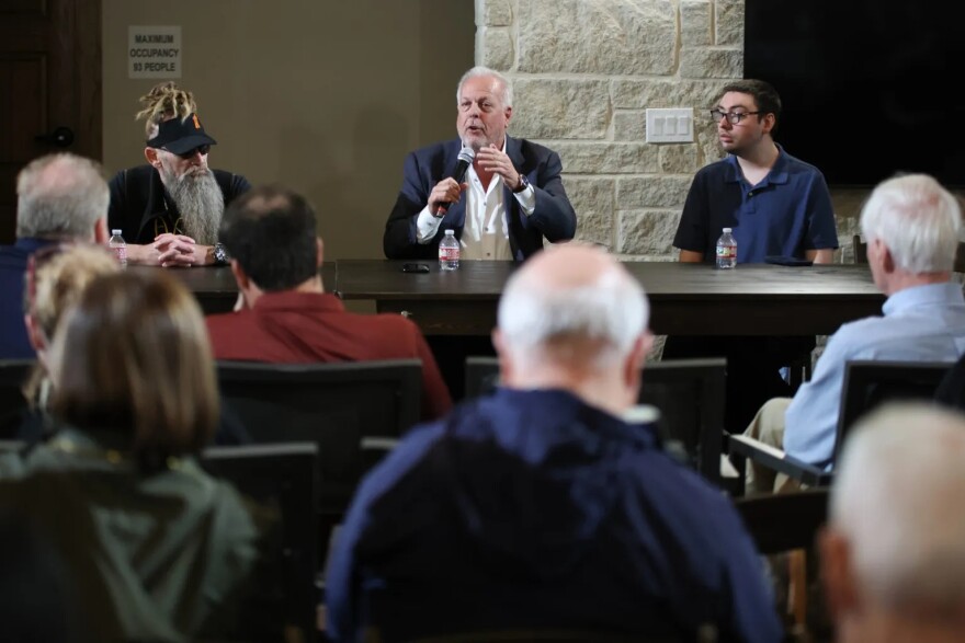 (From left) Shaun Mallory, Jim Ross and Hunter Crow spoke to a packed house at Viridian in Arlington for the Young Men for Arlington candidate forum March 4.