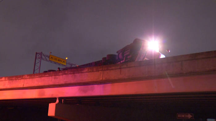 Finesilver Curve closed after 18-wheeler rolls over, spills oil on road