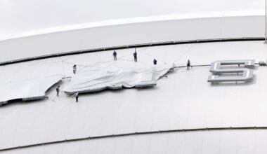 Ahead of the FIFA World Cup matches, crews drape the AT&T Stadium sign atop the stadium’s roof in Arlington, Texas, June 4, 2026. The stadium will be referred to as Dallas Stadium.