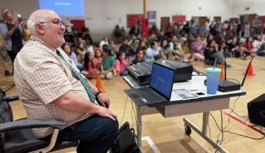 Luiz Mullini Nascimento enjoys his last music performance during a fine arts night at Harmony Science Academy. Mullini taught as a music teacher for 20 years at Harmony with perfect attendance. 