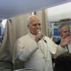 Pope Leo XIV talks to journalists aboard the papal flight from Rome to Madrid on June.