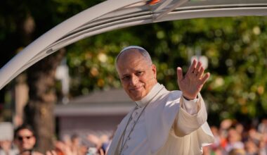 1 million people flood Madrid streets to see the pope's flower-carpeted procession