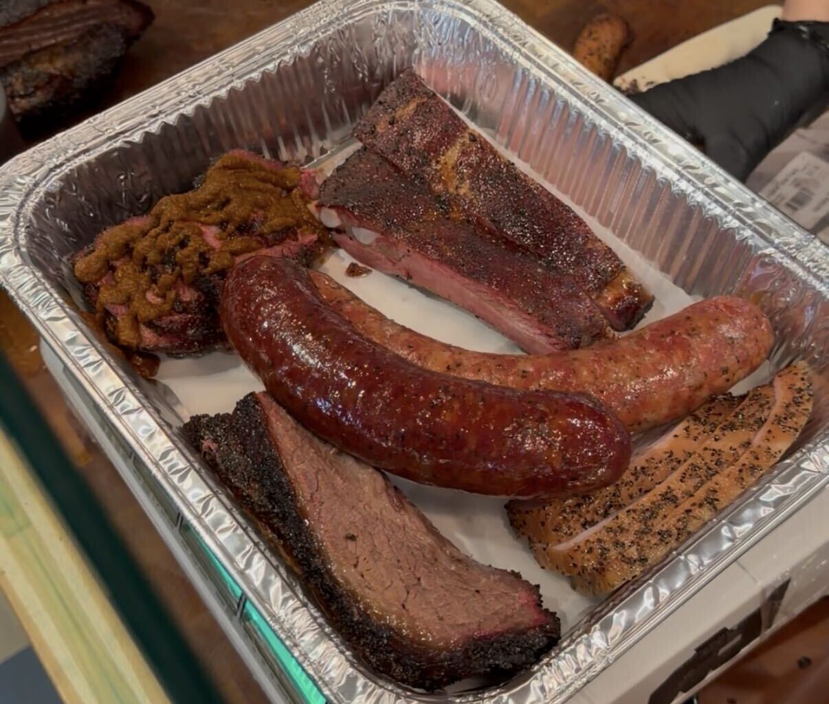 Spread of barbecue at InterStellar BBQ in Austin.