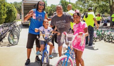 Daughter of ex-Cowboys RB teams up with Spud Webb to donate bikes
