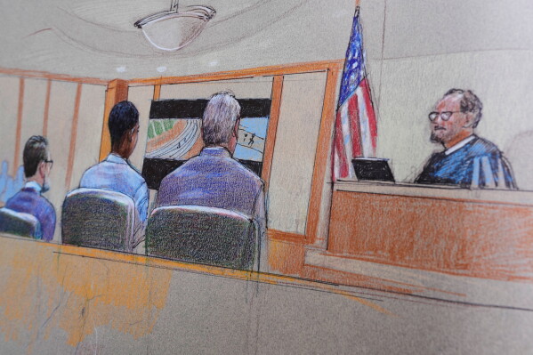 A courtroom sketch, provided by Pat Lopez shows Karmelo Anthony, center, at the defense table, the jury on the left and the presiding judge on the right, on Thursday, June 4, 2026, in McKinney, Texas, during the trial of a teen accused of fatally stabbing another during a track meet in suburban Dallas last year. (Pat Lopez via AP)