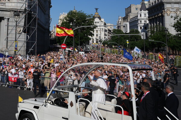 Pope Leo XIV arrives to preside over Mass marking the Catholic feast of Corpus Christi in Plaza de Cibeles in Madrid, Sunday, June 7, 2026, on the second day of a seven-day apostolic journey to mainland Spain and the Canary Islands. (AP Photo/Alessandra Tarantino)