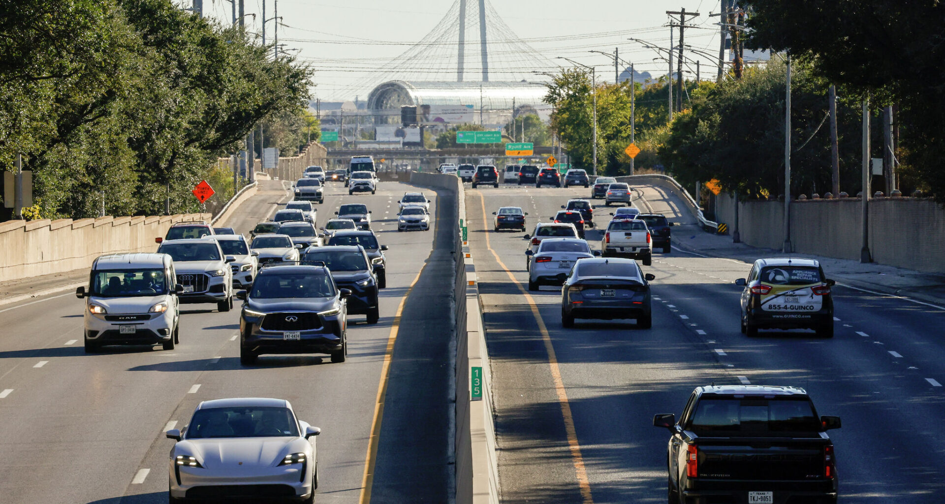 Traffic flows along the Dallas North Tollway near Lemmon Avenue, Wednesday, Nov. 20, 2024, in Dallas.