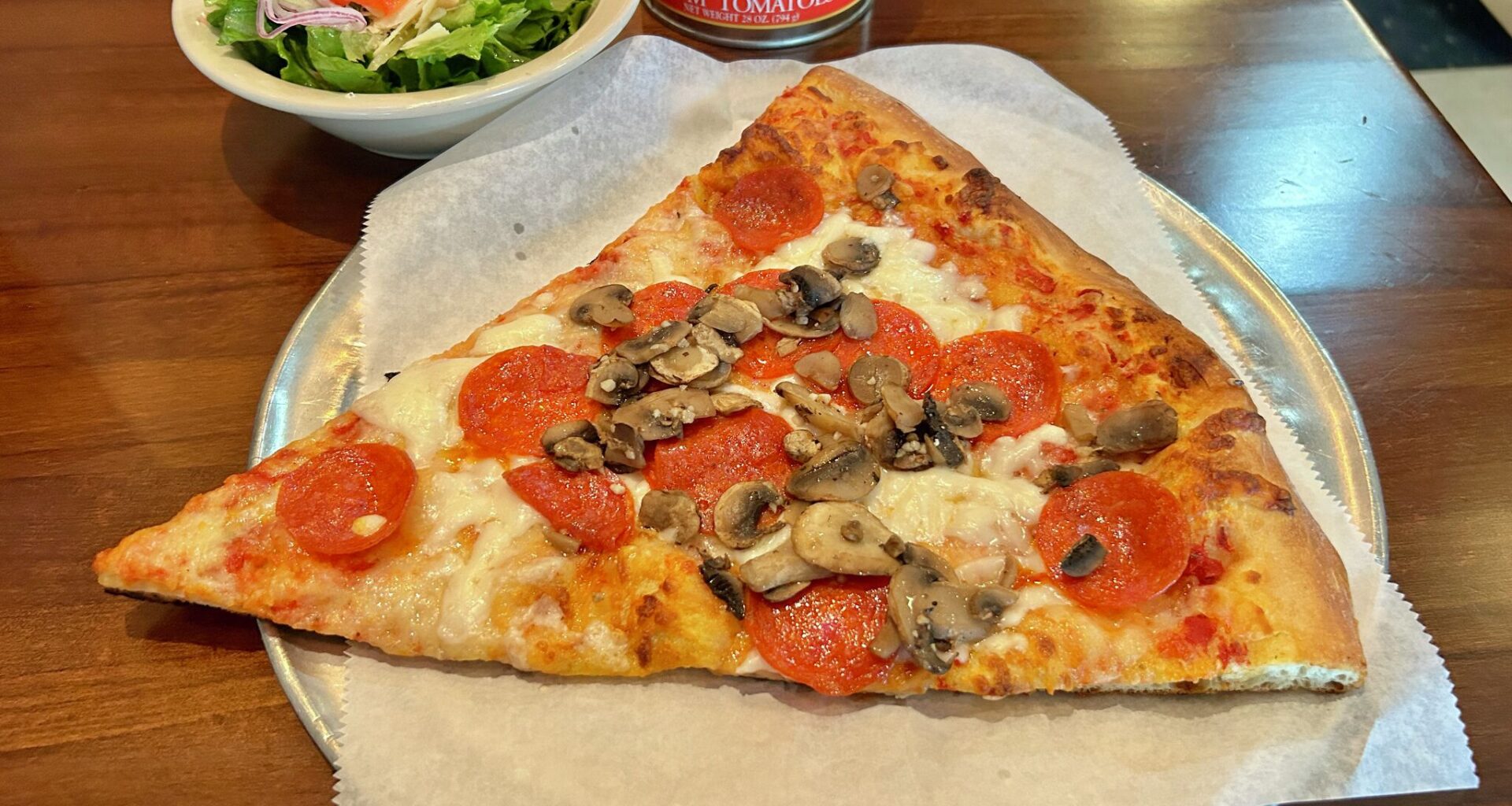 The two-topping pizza slice lunch special is $10.95 at Julian's. 