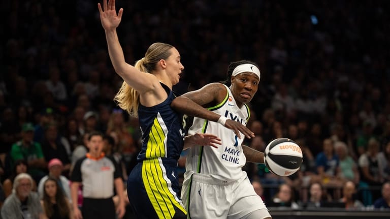 Minnesota Lynx forward Natasha Howard (1) drives against Dallas Wings...