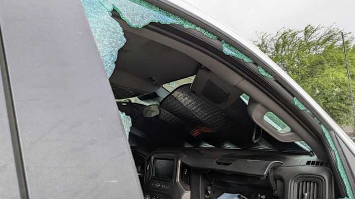 North Side hotel guests wake up to broken car windows, items stolen