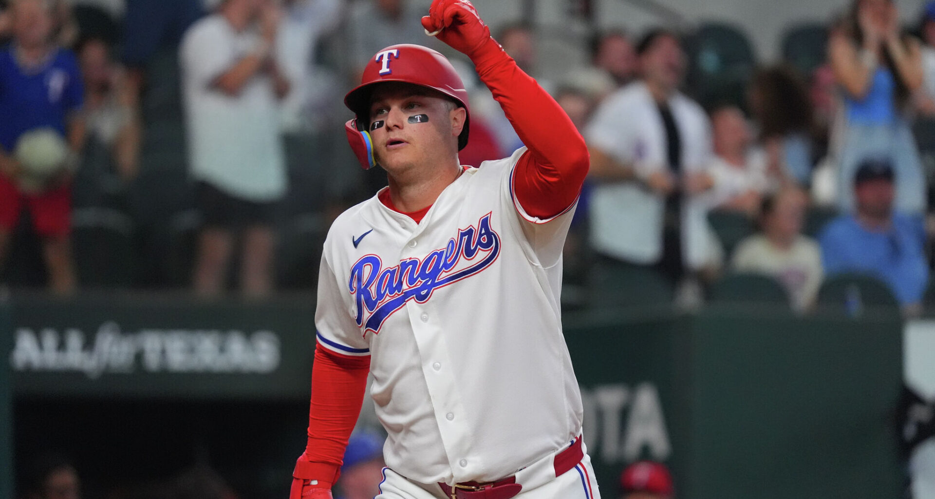 Texas Rangers' Elias Diaz, left, Ezequiel Duran, Jacob Latz (67) and Josh Jung, right, celebrate after their baseball game against the Kansas City Royals, Wednesday, June 10, 2026, in Kansas City, Mo. (AP Photo/Charlie Riedel)