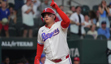 Texas Rangers' Elias Diaz, left, Ezequiel Duran, Jacob Latz (67) and Josh Jung, right, celebrate after their baseball game against the Kansas City Royals, Wednesday, June 10, 2026, in Kansas City, Mo. (AP Photo/Charlie Riedel)