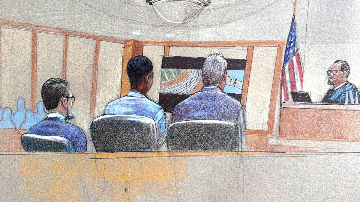 Courtroom sketch shows Karmelo Anthony seated with attorneys as surveillance video is presented during his murder trial in the fatal stabbing of Austin Metcalf at a Texas high school track meet