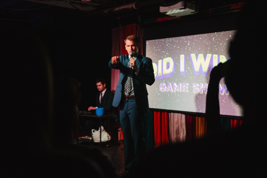 Trenton Bradley on stage at Did I Win? at Fallout Theater on Saturday, May 9, 2026.