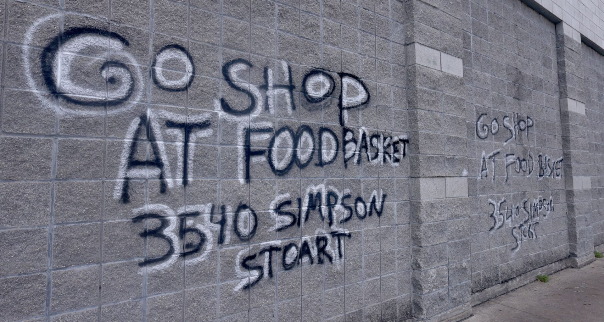 A spray-painted message on the front of Cash Saver grocery store redirects shoppers to another option as the Ledbetter location closed its doors permanently this week. Photos of Cash Saver, one of the few grocery stores serving east Oak Cliff, were taken at 2130 E. Ledbetter Drive in Dallas on June 10, 2026.