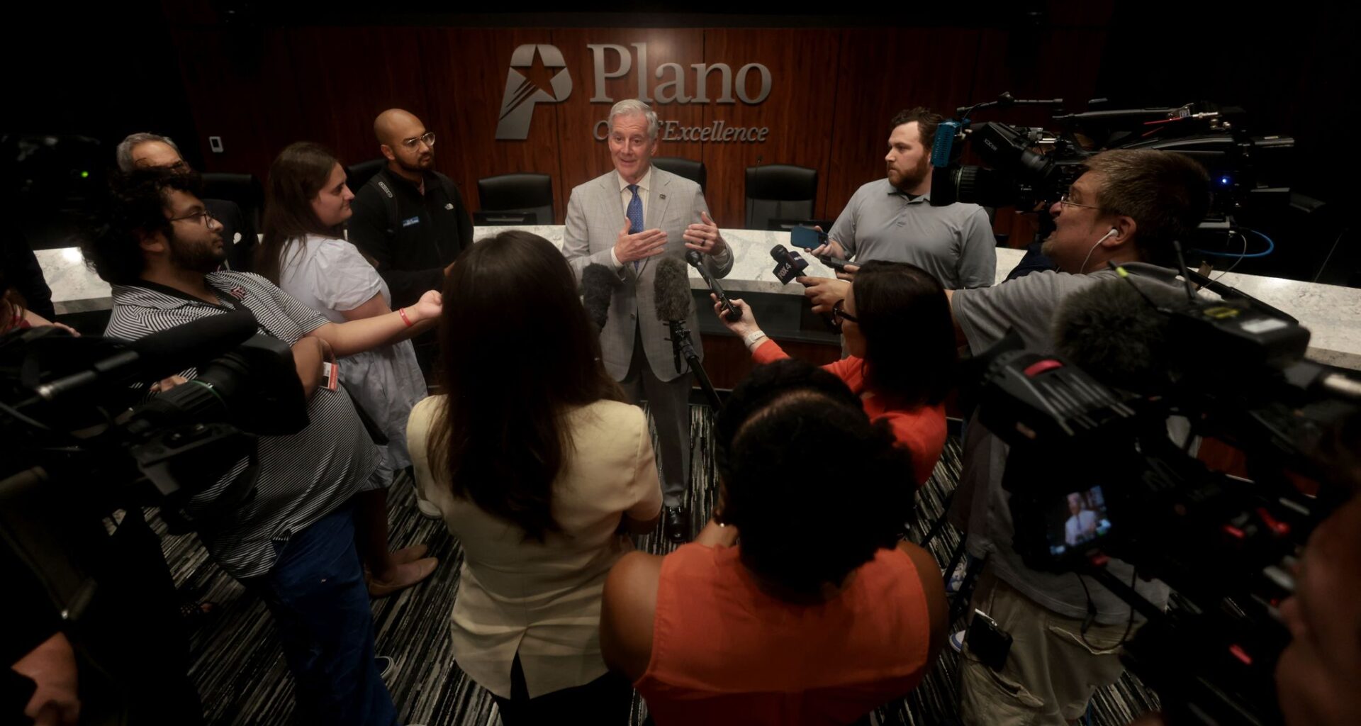 Plano Mayor John Muns answers a question during a news conference following a meeting for council members to vote on whether to approve key measures in the Dallas Stars’ proposed new arena at the Shops at Willow Bend. The meeting was conducted at the Senator Florence Shapiro Council Chambers, 1520 K Avenue in Plano, on June 8, 2026.