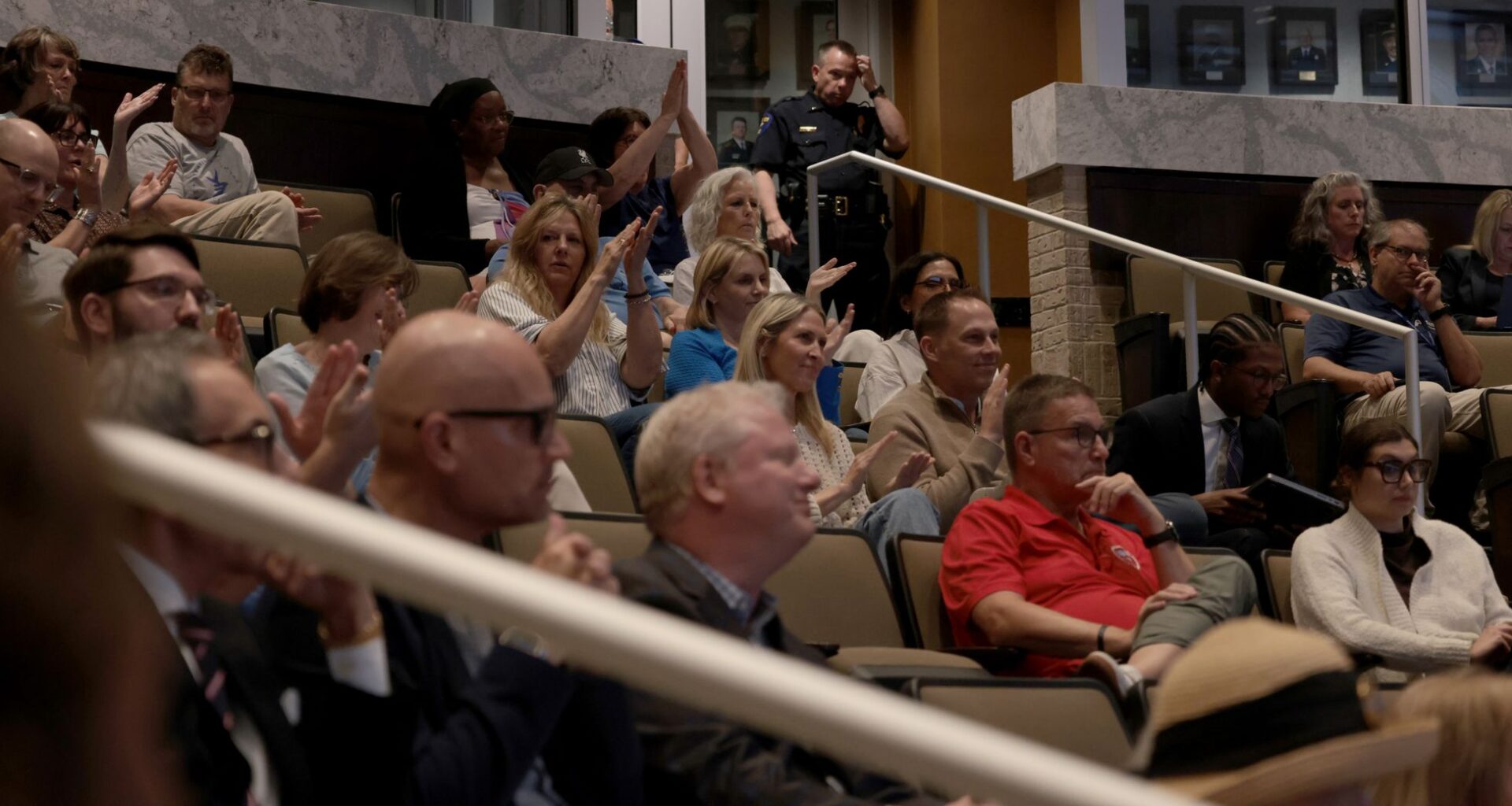 Concerned citizens applaud comments from a resident shared during a meeting held for council members to vote on whether to approve key measures in the Dallas Stars’ proposed new arena at the Shops at Willow Bend. The meeting was conducted at the Senator Florence Shapiro Council Chambers, 1520 K Avenue in Plano, on June 8, 2026.