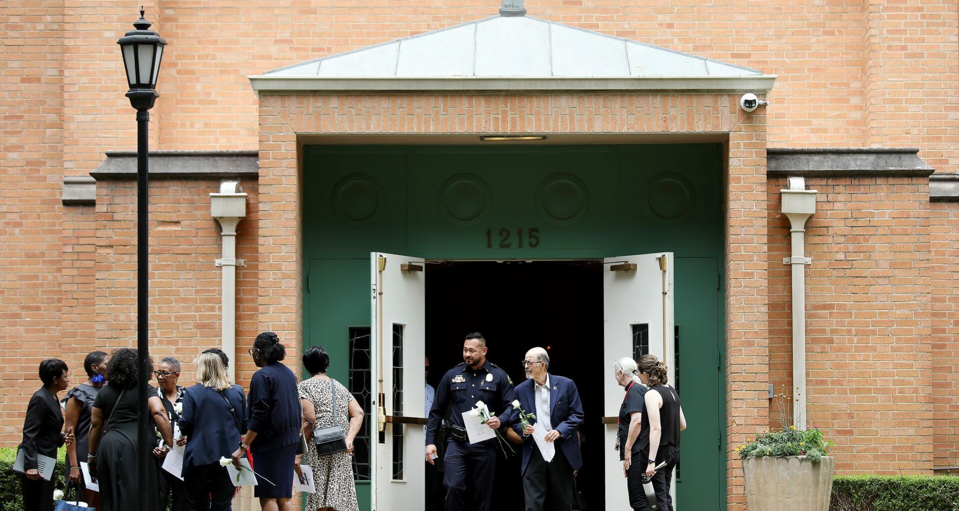 Mourners leave the funeral for Dallas community activist Sylvia Collins, at Kessler Park United Methodist Church in Dallas, Texas, Saturday June 13, 2026. Collins was one of the victims of the Oak Cliff gas explosion.