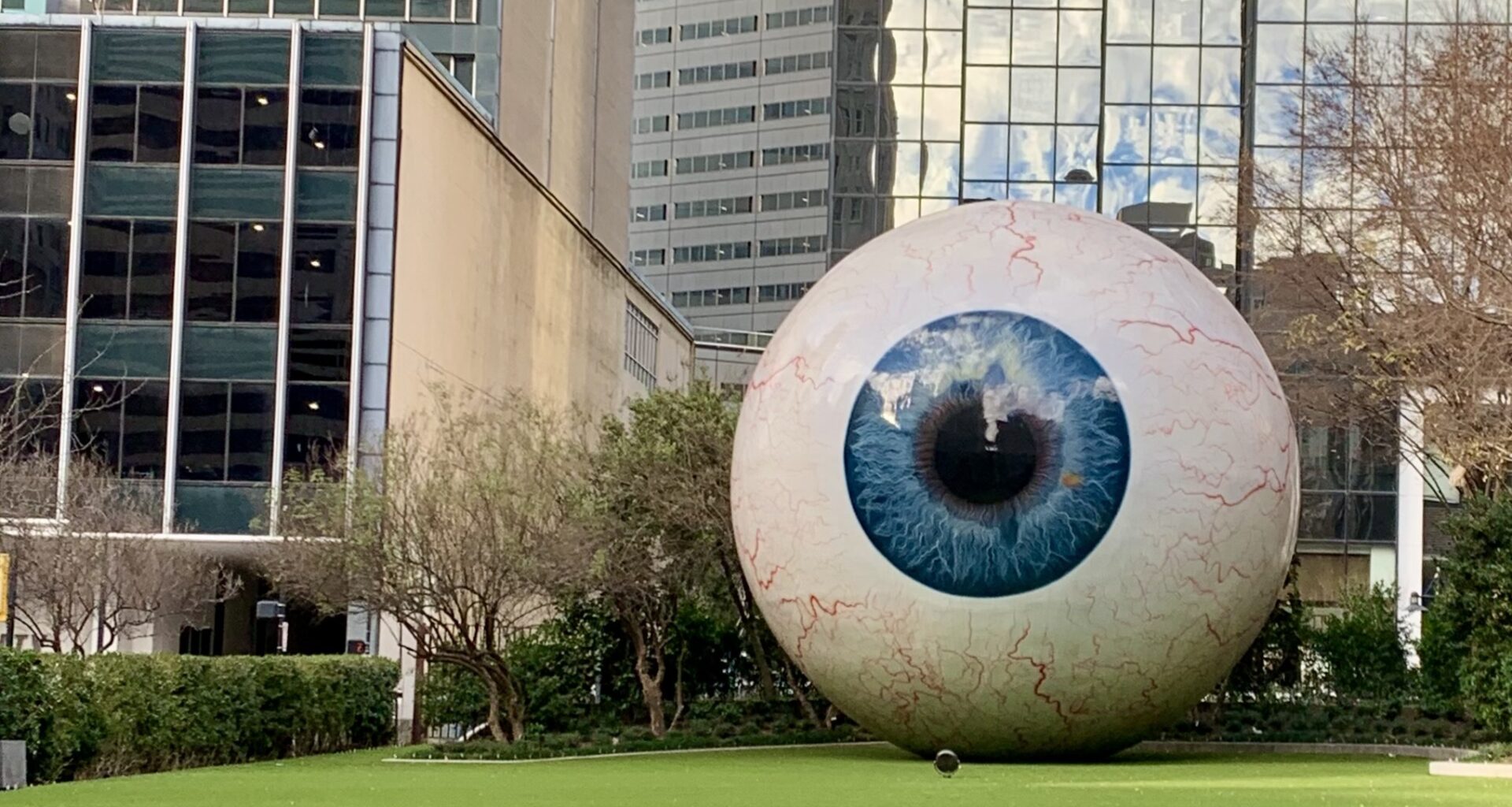 Why does Dallas have a giant eyeball statue downtown?