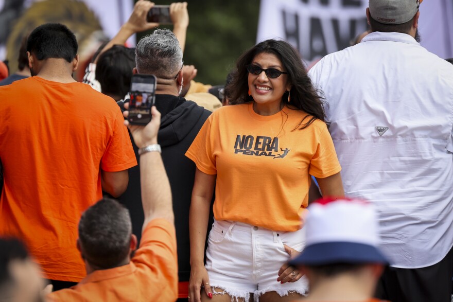 A fan wears a “no era penal” shirt for the Orange Army March before the Netherlands and Japan World Cup game Sunday, June 14, 2026, in Arlington.