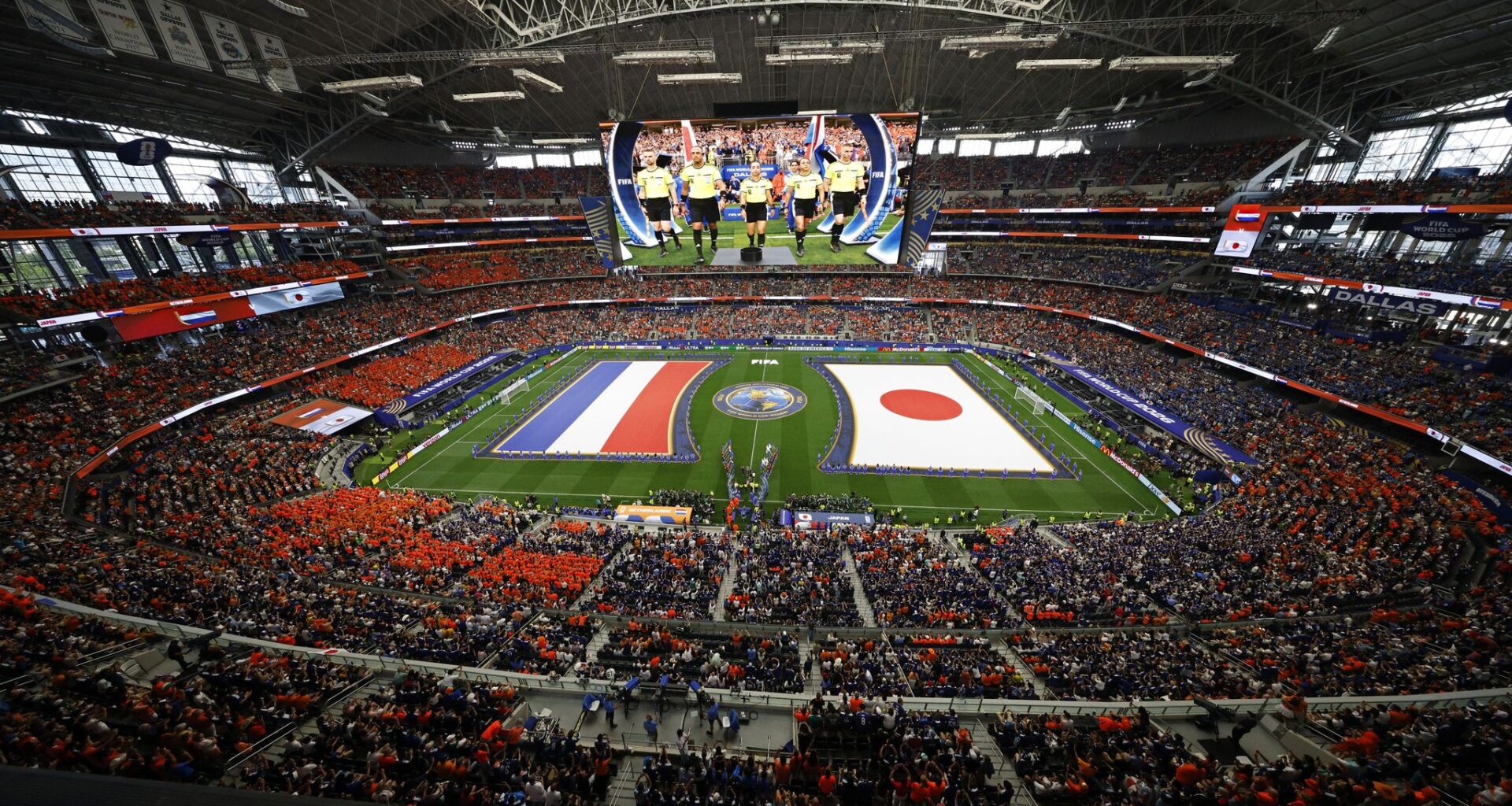 A sea of Netherland fans gather around a double-decker Dutch Orange Bus as they prepare to leave from Choctaw Stadium on their way to the match first of nine FIFA World Cup matches at Dallas Stadium in Arlington, June 14, 2026.