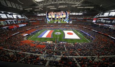 A sea of Netherland fans gather around a double-decker Dutch Orange Bus as they prepare to leave from Choctaw Stadium on their way to the match first of nine FIFA World Cup matches at Dallas Stadium in Arlington, June 14, 2026.