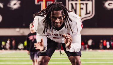 Kirby Hocutt smiles while talking to supporters on the sidelines prior to Texas Tech's 2025 opener versus UAPB.