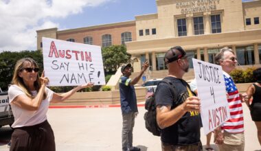 Supporters of Austin Metcalf hold signs before a verdict is announced in Karmelo Anthony’s murder trial outside of the Collin County Courthouse in McKinney, TX, Tuesday, June 9, 2026. The Collin County jury found Karmelo Anthony guilty of murder in the fatal stabbing of 17-year-old Metcalf last April at a Frisco track meet at David Kuykendall Stadium.
