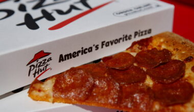 A pepperoni pizza from a Pizza Hut restaurant, a unit of Yum! Brands Inc., is arranged for a photograph in Torrance, California, U.S., on Monday, Oct. 7, 2013. ORG XMIT: 183740169
